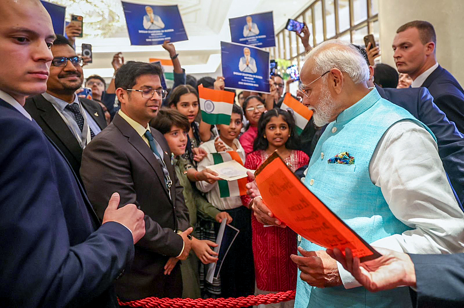 PM Modi receives warm welcome from members of Indian diaspora at hotel in Moscow