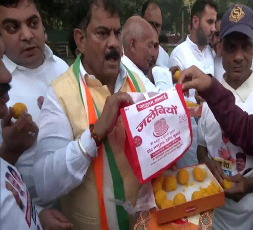 Counting Day: Congress workers celebrate with laddoos, jalebis as party leads in early trends in Haryana, JK