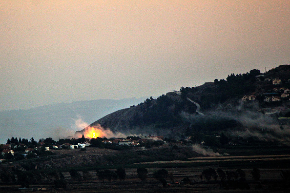 Hezbollah missiles hit Haifa, Israel steps up bombings in south Lebanon