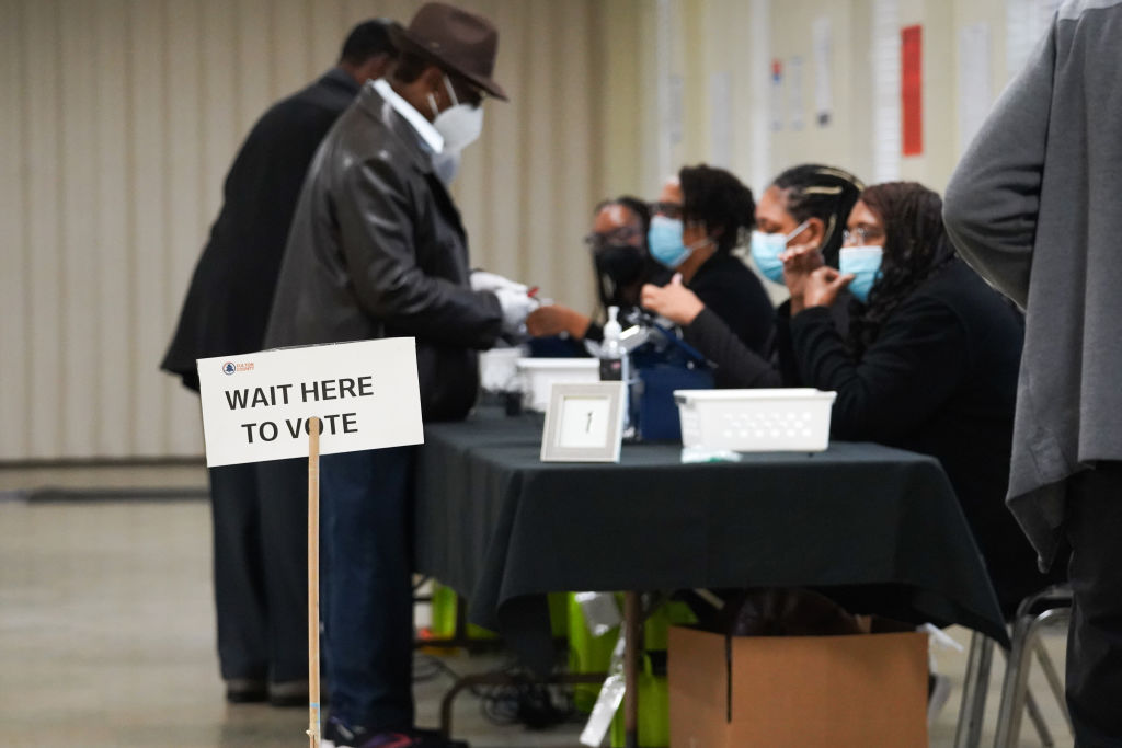 U.S. elections: Georgia reports record turnout as early voting begins in battleground state