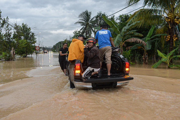 Three dead, thousands displaced as Malaysia warns of worst floods in a decade