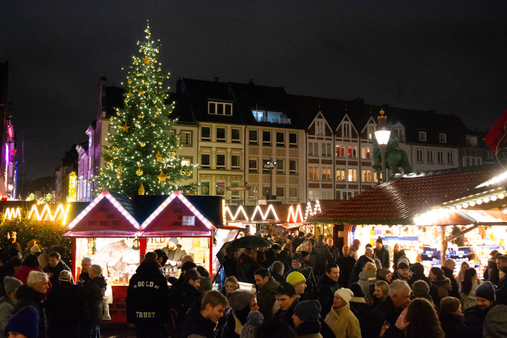 Suspect in German Christmas market attack held on murder charges after night of grief, scuffles