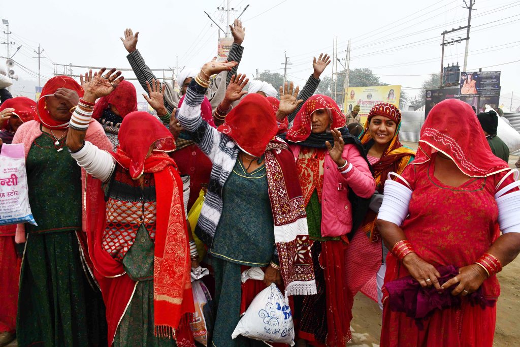 Devotees arrive at Triveni Sangam during Maha Kumbh 2025