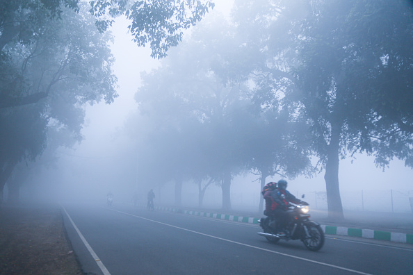 Dense fog disrupts flights and trains in Delhi as mercury plummets