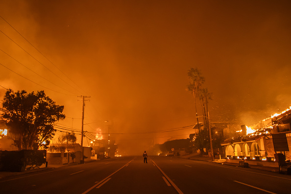 Calmer winds help Los Angeles firefighters as death toll hits 10