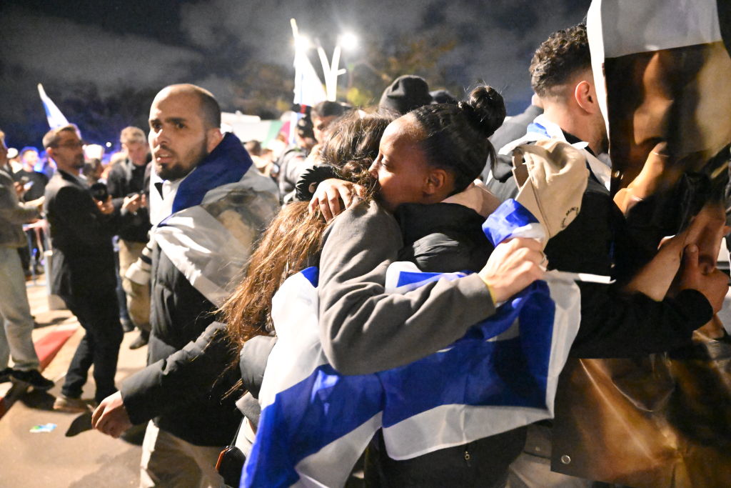 Israel-Hamas ceasefire: Freed Israeli hostages reunite with families