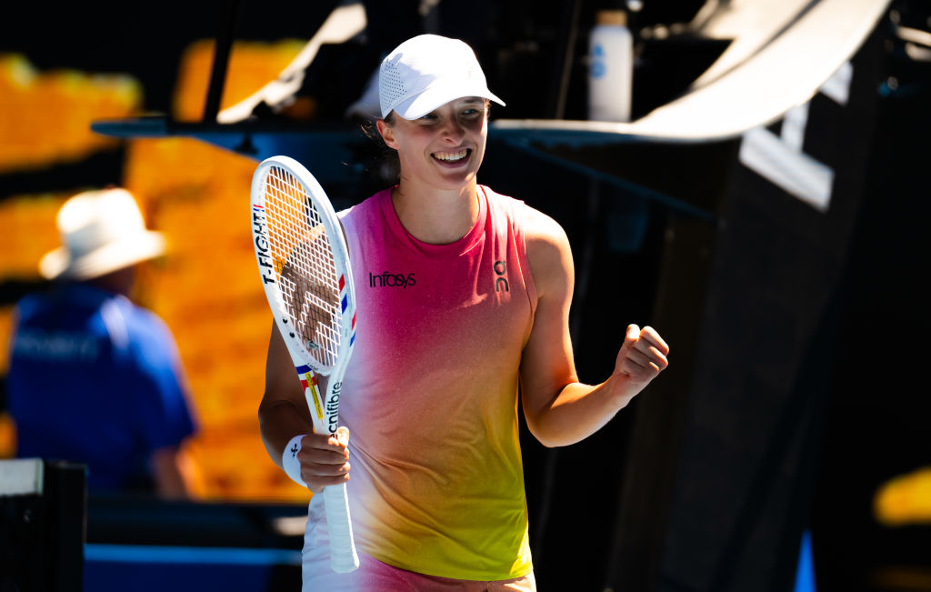 Swiatek charges into Australian Open semi-finals