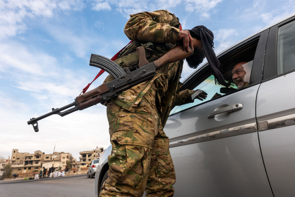 Syrian forces search former Assad stronghold after suspected loyalist attacks