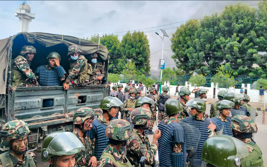 Soldiers guard Nepal’s parliament, patrol streets after two days of deadly protests