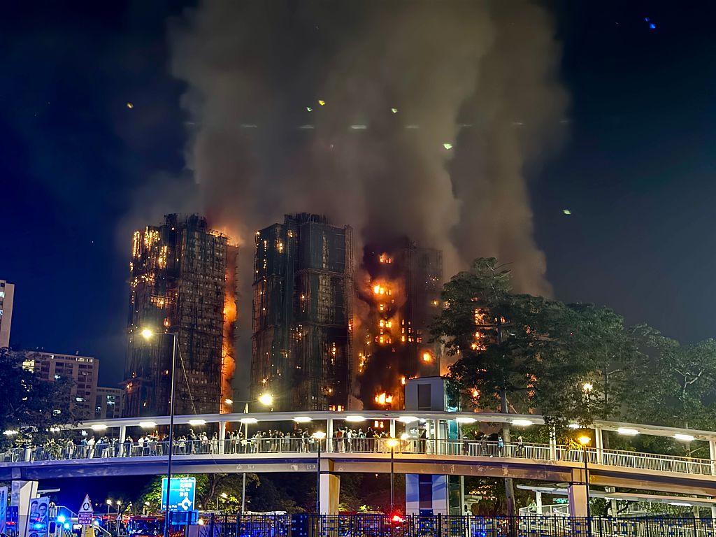 Hong Kong fire kills 55, hundreds missing as police blame ‘grossly negligent’ construction firm
