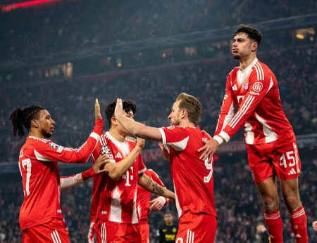 Harry Kane’s double sends Bayern through in Champions League