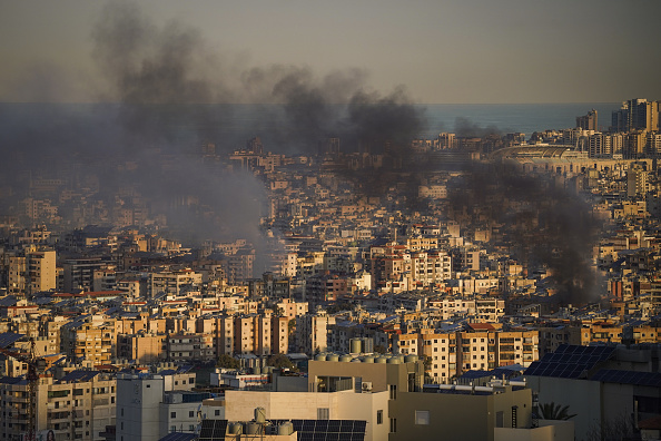 Israel says it targeted Iranian commanders in Beirut as death toll nears 400