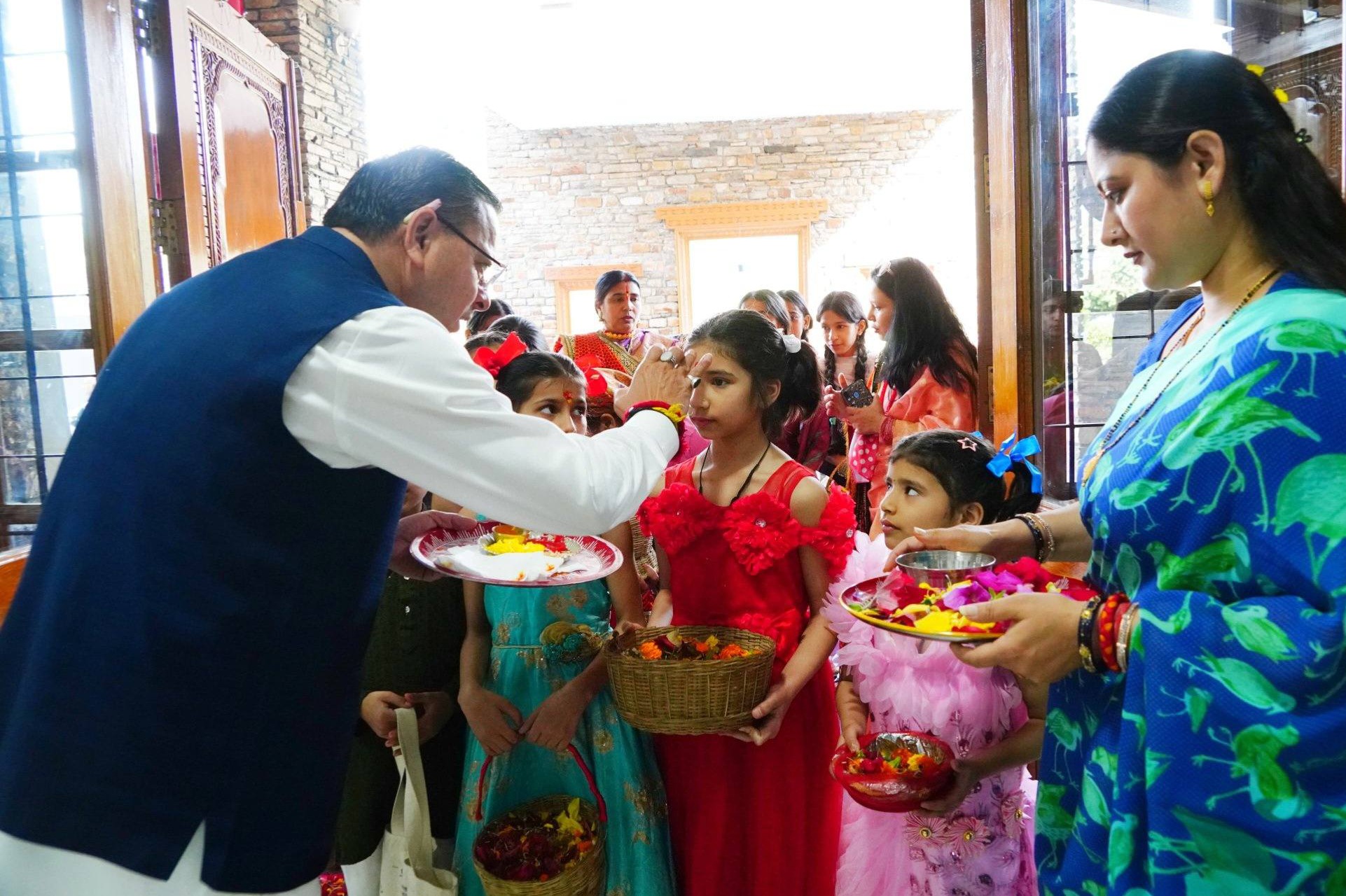 Uttarakhand CM Pushkar Singh Dhami celebrates ‘Phool Dei’ festival at his residence
