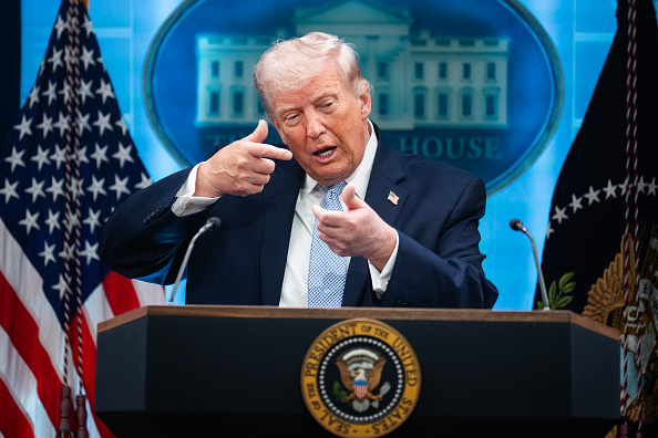 Trump urges Iran to sign a deal and discusses prolonged blockade