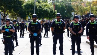 Protesters clash with Australian police after suspected killer of Indigenous girl arrested