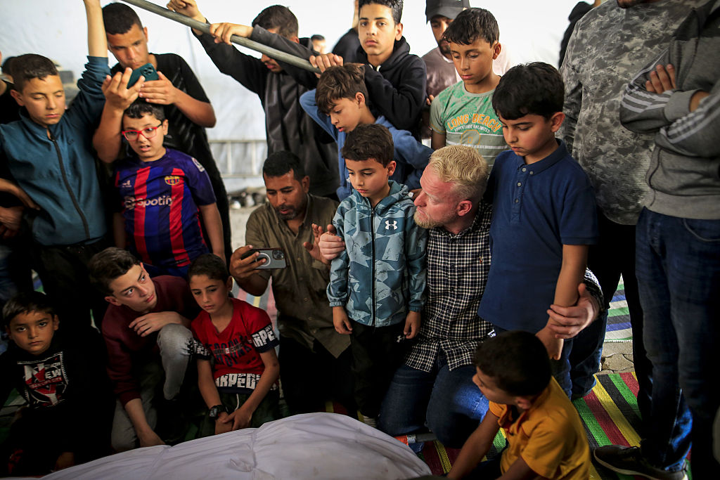 Israeli fire kills boy in Gaza as witnesses report increase in orders to flee