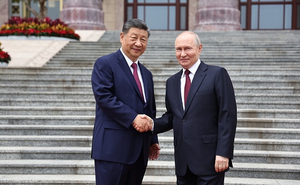Xi and Putin unite to criticise US, but fail to clinch big gas deal
