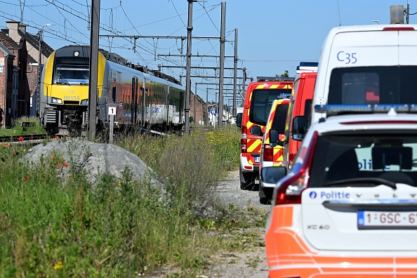 Belgian train hits school minivan, killing four including pupils