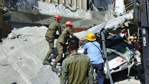 Powerful Philippine quake leaves at least 32 feared dead, survivors recount fear