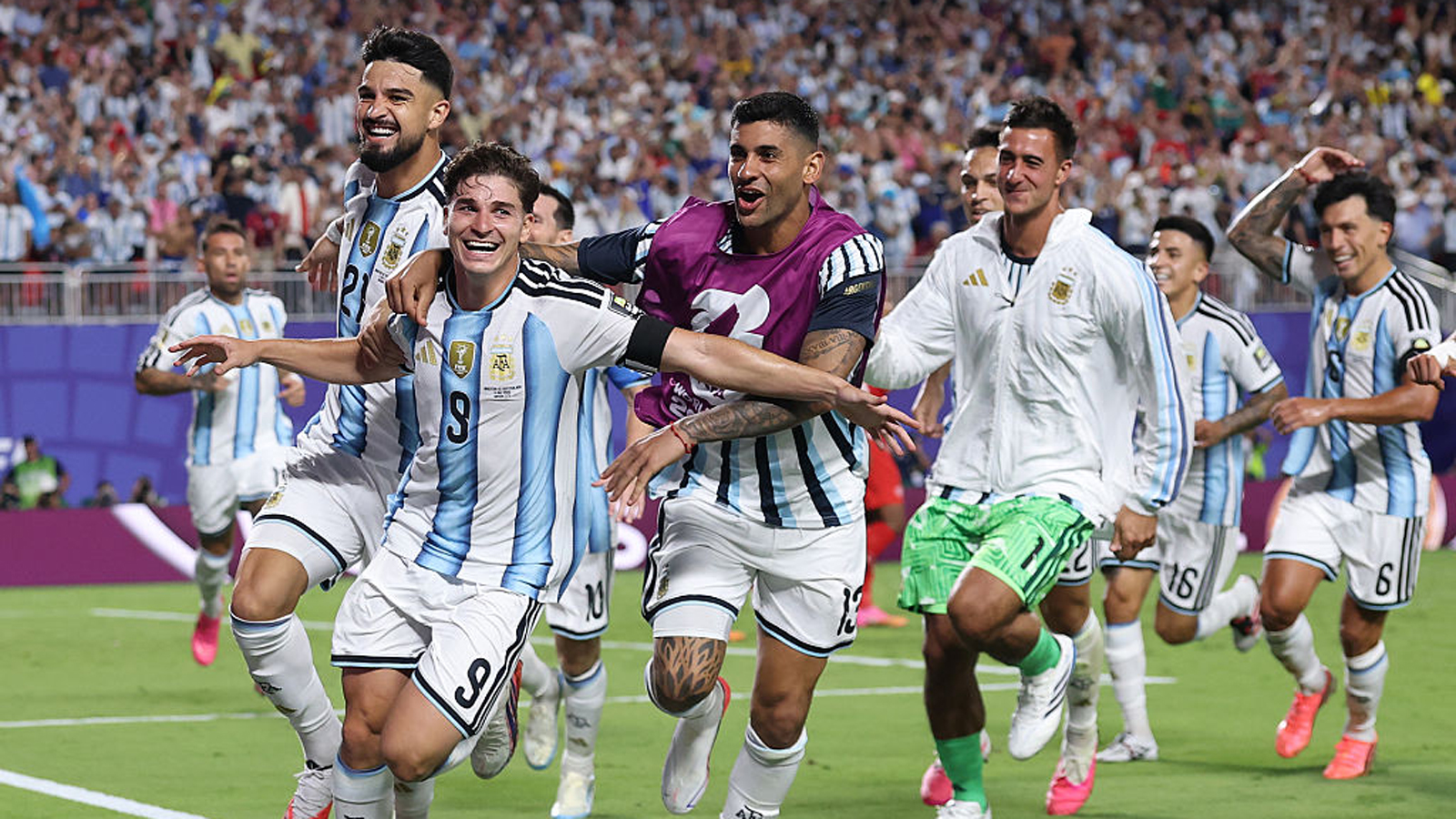 Argentina strike late in extra time to sink 10-man Swiss and reach World Cup semis