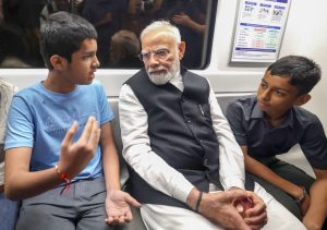 PM Modi’s ride in Delhi Metro happily surprises children, co-passengers