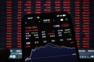 Asia stocks waver as yen surges, Iran warns of retaliation
