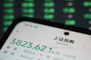 Asian shares track Wall Street higher, Treasury yields near multi-decade highs